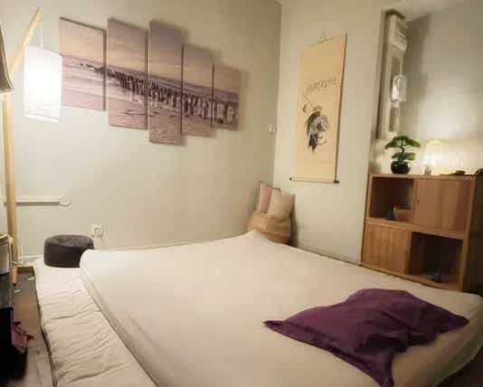 Salle de soin du cabinet Terre de Shiatsu Lyon 5e avec un futon