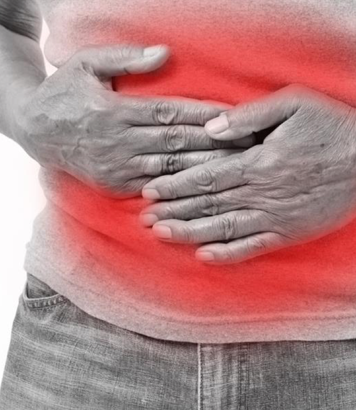 Personne tenant son ventre avec les deux mains, illustrant une douleur ou un inconfort digestif. L’image met en évidence la zone abdominale avec un effet rouge, symbole de tension ou d’inflammation interne, en lien avec les troubles digestifs - soulagez les au cabinet Terre de Shiatsu Lyon 5e